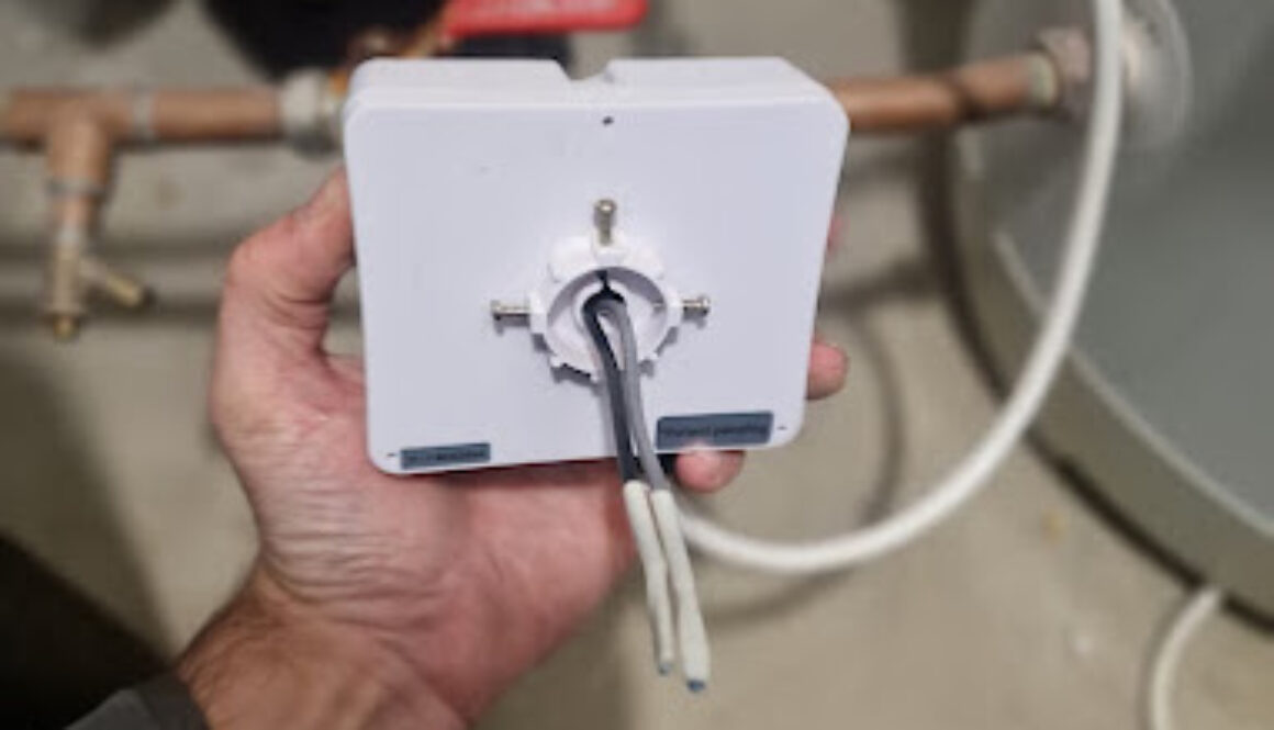 Gas Safe registered engineer servicing a modern boiler in a local home, provided by ELC Boilers.